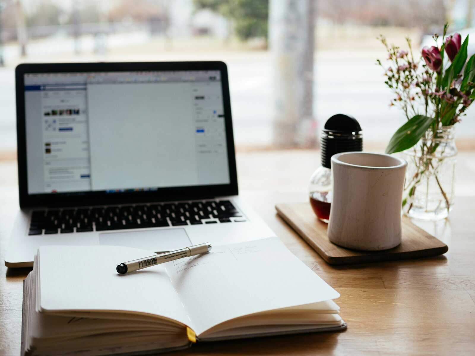 Content Marketing Mastery: Your Winning Playbook for Service-Based Businesses MacBook Pro near white open book
